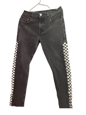 Levi’s Exclusive find: Black Levi's 512s with a checkered side stripe.